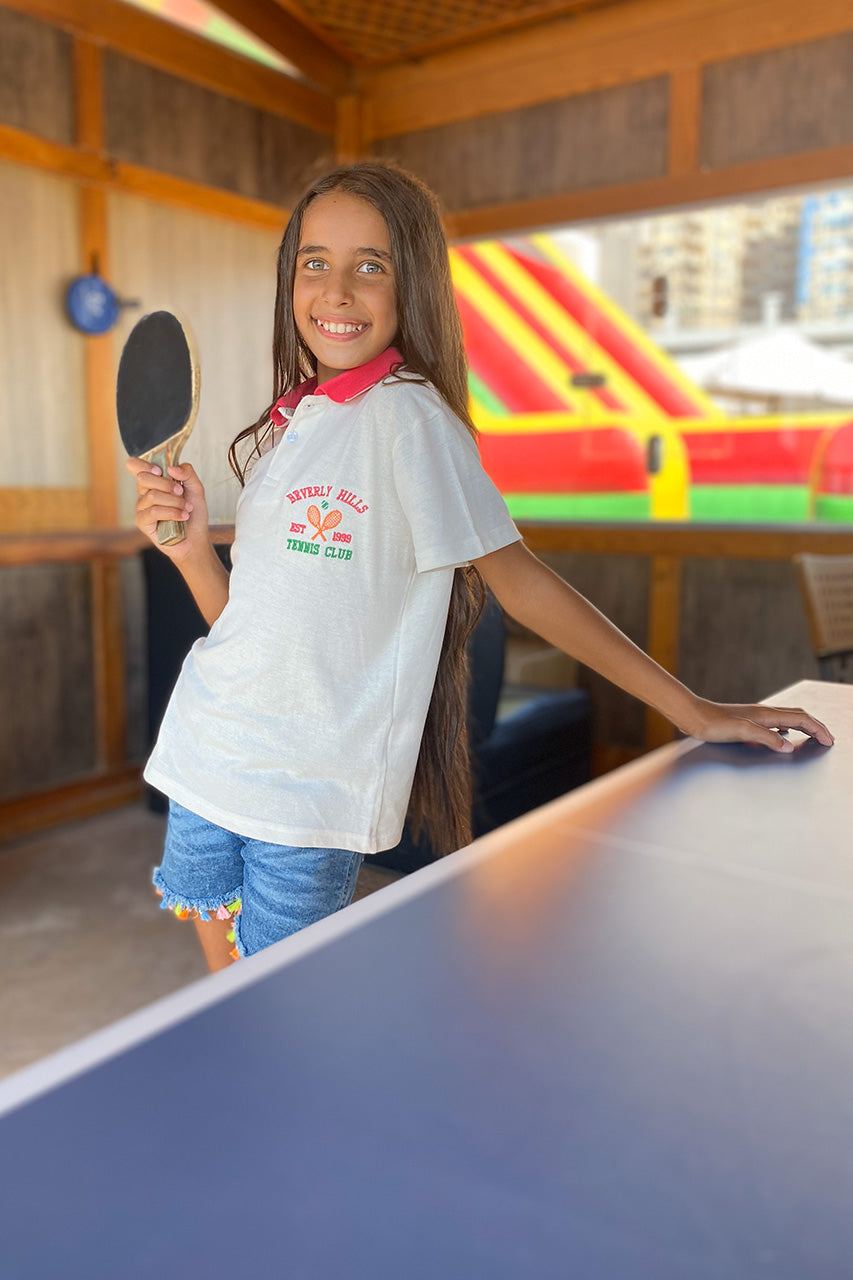 Girl's polo t-shirt - White - side view