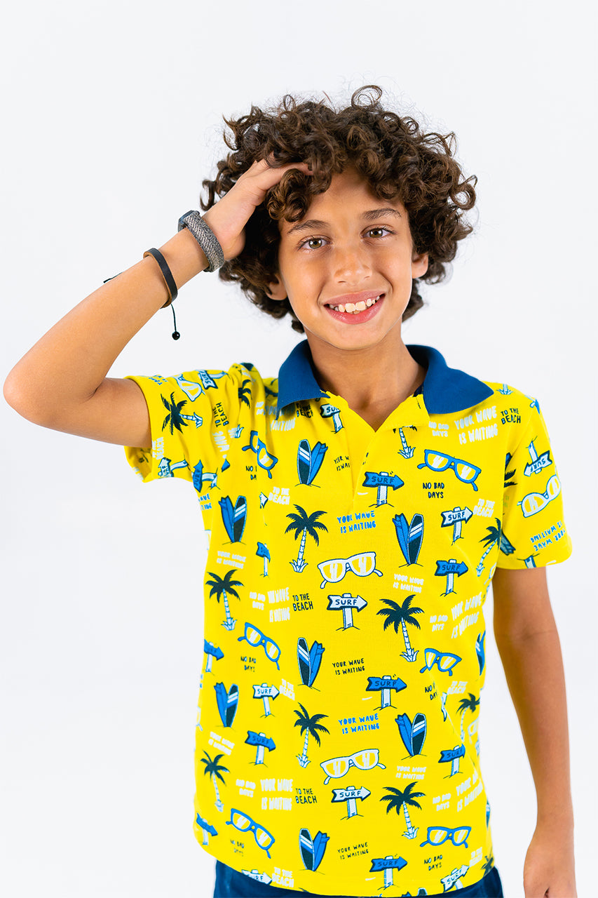 Boy's polo t-shirt with palm tree printed- yellow- zoom in view